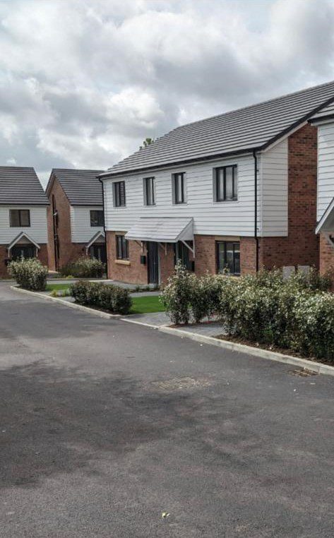 SEH Landscapes Ltd, a Landscape Gardening business in East Sussex & Kent, showcasing commercial landscaping work in a newly developed housing area.